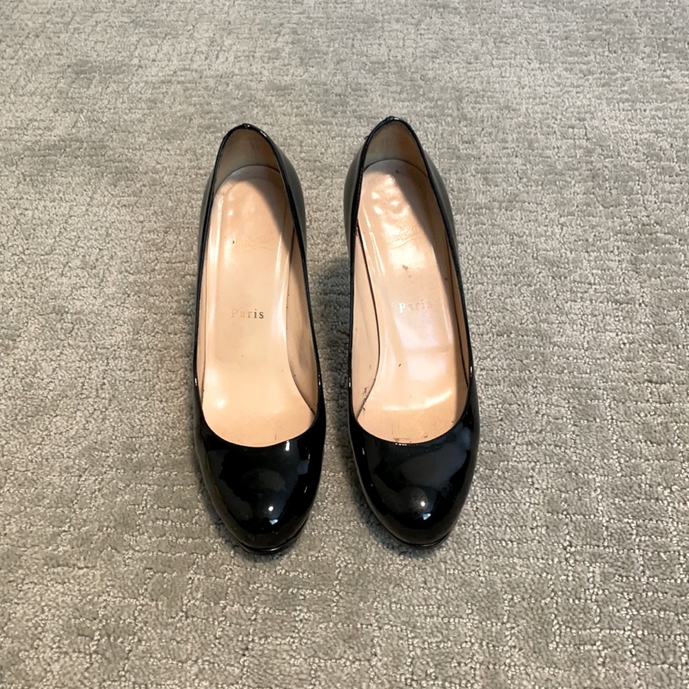 Christian Louboutin heels. Round toe. Small platform.black